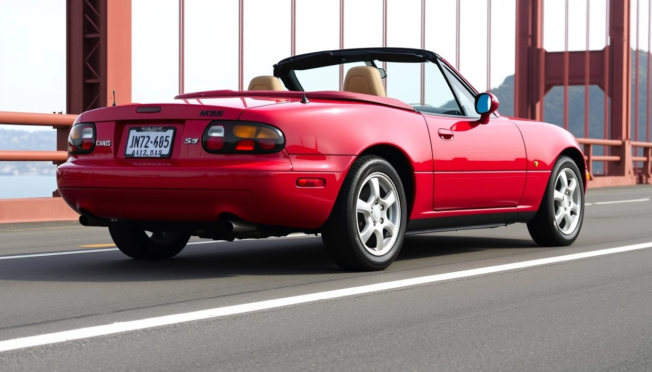 Red 1991 Mazda MX-5 on the Golden Gate Bridge. - Image