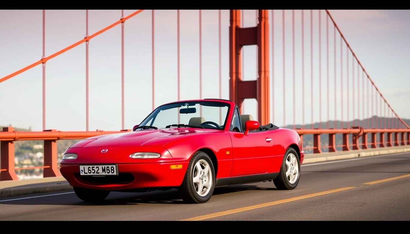 Red 1991 Mazda MX-5 on the Golden Gate Bridge.