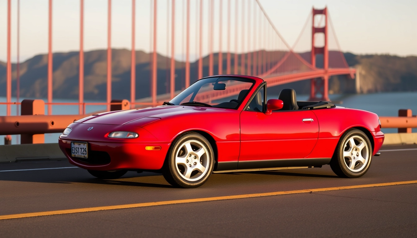 Red 1991 Mazda MX-5 on the Golden Gate Bridge. - Image