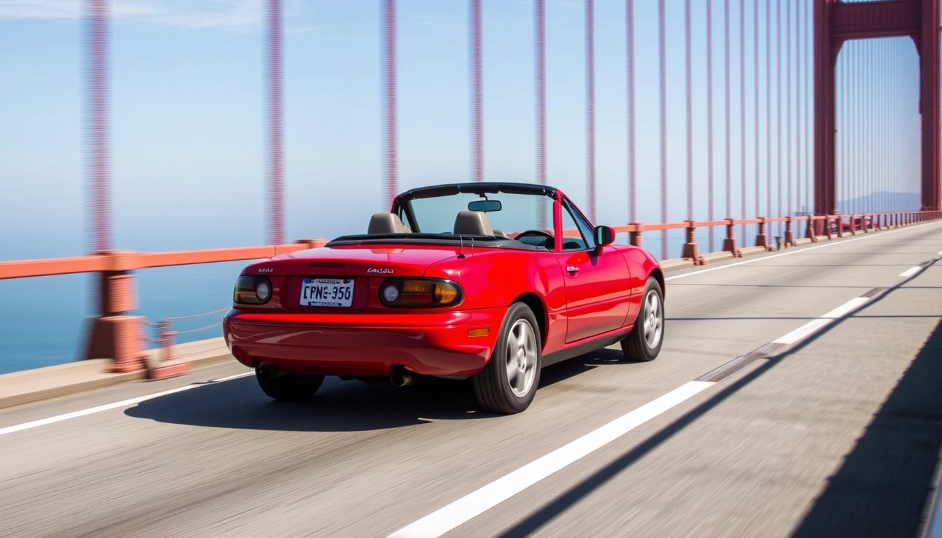 Red 1991 Mazda MX-5 on the Golden Gate Bridge.